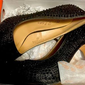 High heels with black stones all over